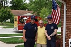 City Resident with two Fireman