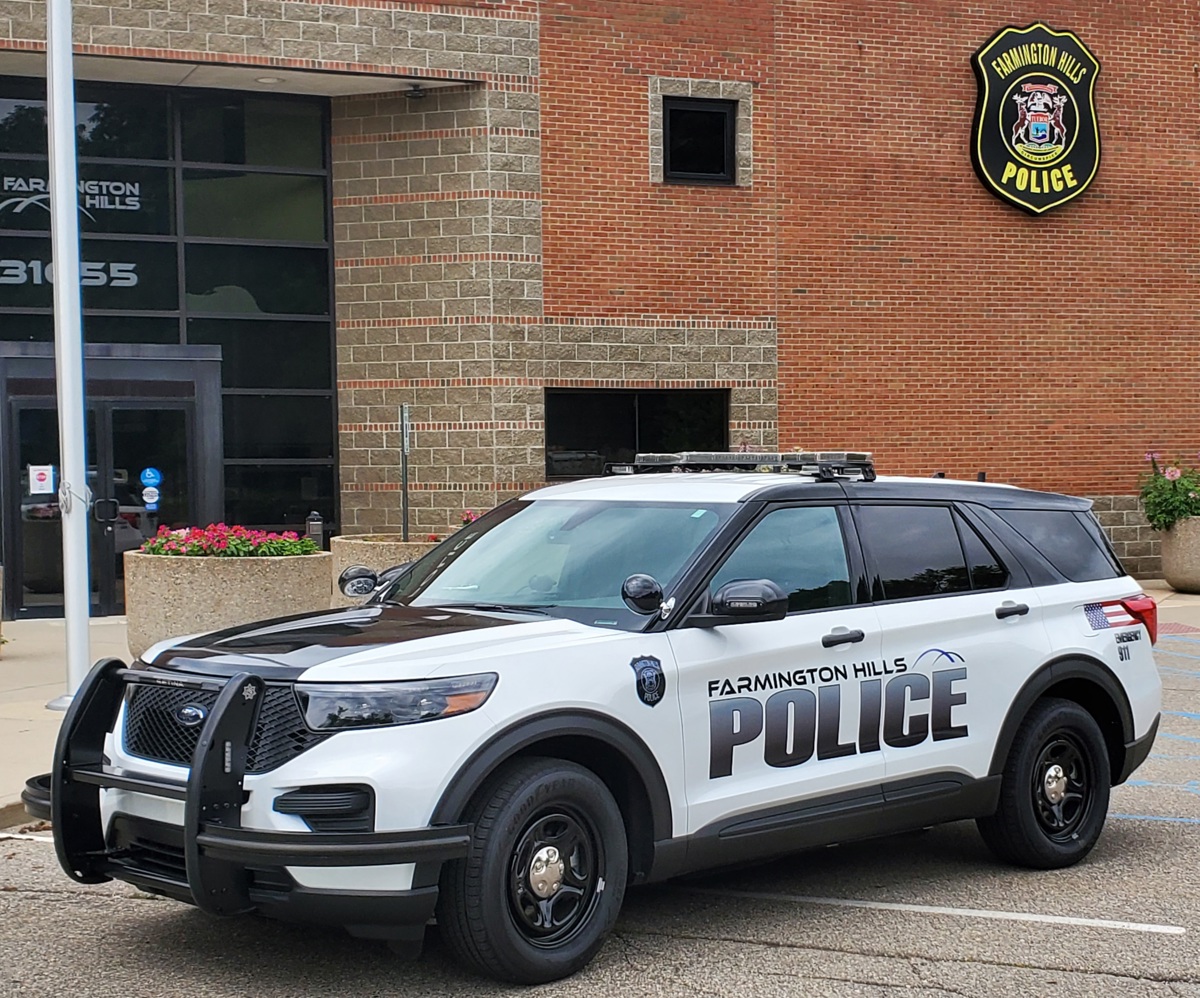 Police Vehicle In Front Of Police Department Sidebar